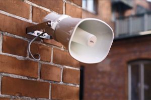 megaphone-speakers-on-wooden-post-776153